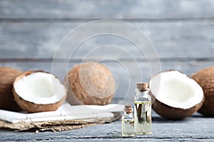 Oil in bottles with coconuts