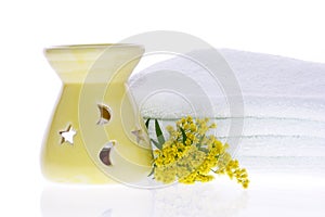 Oil Burner, Yellow Flower and White Towel