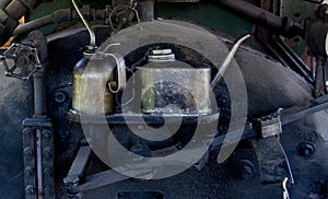 Oil cans and train engine