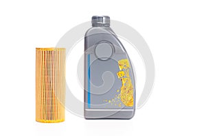 Oil change. Oil filter and plastic bottle of engine oil