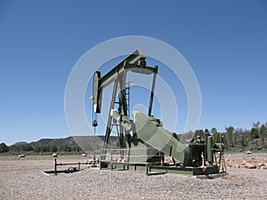 Oil Derrick at work in Alberta, Canada.