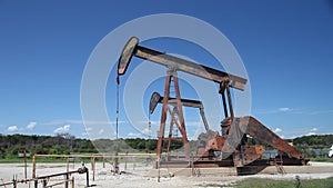 Oil derricks in hagerman wildlife refuge on lake Texoma.