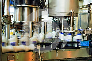 Oil is dispensed into quart bottles