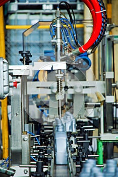 Oil is dispensed into quart bottles