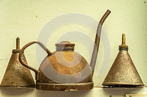 Oil dispensing cans at Posada Estancia Rio Verde, Riesco Island,, Chile