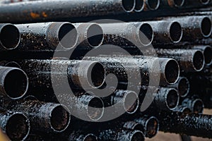 Oil Drill pipe. Rusty drill pipes were drilled in the well section.
