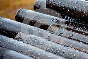 Oil Drill pipe. Rusty drill pipes were drilled in the well section. Downhole drilling rig.