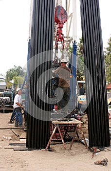 Oil drillers at work photo