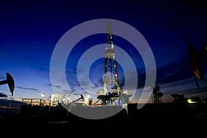 Oil drilling platform in the beautiful night