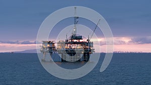 Oil drilling rig lying at underwater depth of the Gulf of Santa Catalina. Dawn