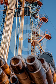 Oil drilling rig operation on the oil platform in oil and gas industry. Industrial concept.