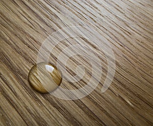 Oil drop an a wooden surface