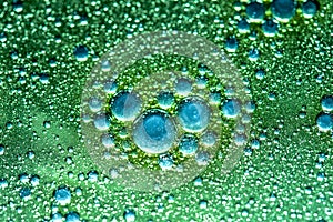 Oil drops on a water surface