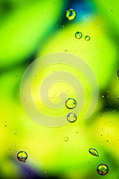 Oil drops on a water surface abstract background