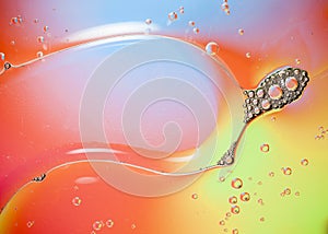 Oil drops on water surface