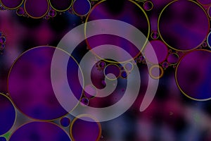 Oil drps in a water .Abstract bubbles on a spotty background. Distortion in water with oil droplets