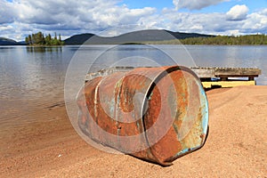 Oil drum at lake