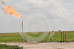 Oil Field Flare. Flaring Methane As An Oil Byproduct Creating Emissions