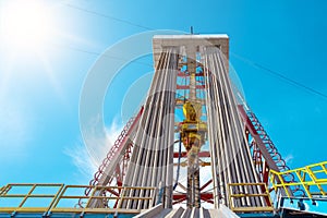 Oil and Gas Drilling Rig. Oil drilling rig operation on the oil platform in oil and gas industry. Front View of Derrick of