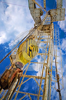 Oil and Gas Drilling Rig. Oil platform isolated on white background. Drilling rig in oil field for drilled into subsurface in