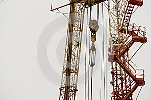 Oil and Gas Drilling Rig onshore dessert with dramatic cloudscape. Oil drilling rig operation on the oil platform in oil and gas