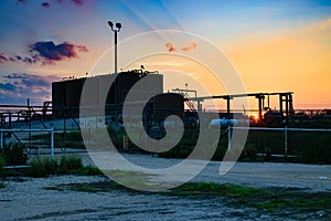 Oil and Gas Facility at Sunset in Permian Basin