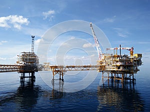 Oil and gas industry and hard work. Offshore construction platform