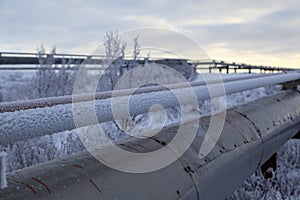 Oil, gas industry. High pressure gas well, pipe fittings, valves in frost in the frost