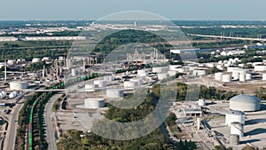 Oil and gas petrol fuel refinery petrochemical plant and tanks. Wide shot