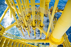 Oil and Gas Producing Slots at Offshore Platform, Oil and Gas Industry. Well head slot on the platform or rig