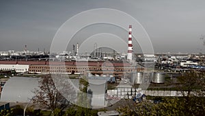 Oil and gas refinery factory panorama. Air pollution in a big city