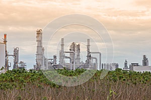Oil and gas refinery industry plant, Power electric factory, Chemical storage tanks and sunlight