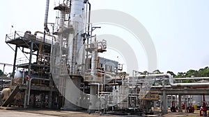 Oil gas refinery, oil refinery or chemical factory and power plant with many storage tanks and pipelines