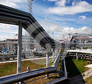 Oil and gas refinery with pipelines, cable lines