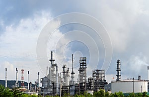 Oil and gas refinery plant and storage tank form industry zone with Air pollution smoke, Oil and gas Industrial petrochemical fuel