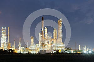 Oil gas refinery plant at twilight.