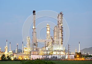 Oil gas refinery plant at twilight.