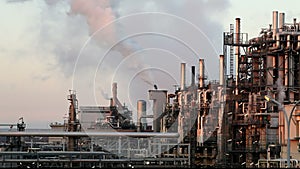 Oil gas refinery with reflection, factory, petrochemical plant