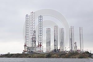 Oil and gas refinery at sea coast port giant vertical structure in Dundee Scotland UK