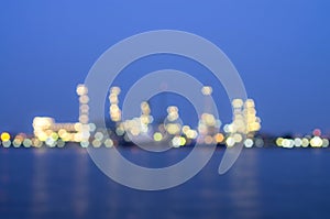 Oil and gas refinery at twilight time, Blurred Photo bokeh