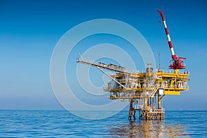 Oil and Gas wellhead remote platform at the Gulf of Thailand. photo