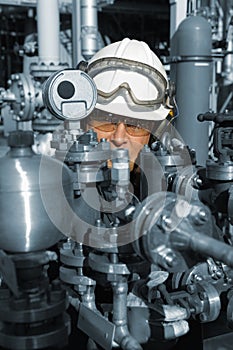 Oil and gas worker with machinery