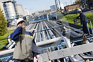 Oil and gas workers with pipelines