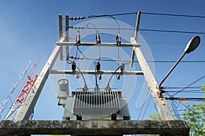 Oil immersed distribution transformer on platform photo