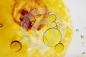 Oil and iodized polyvidone droplets