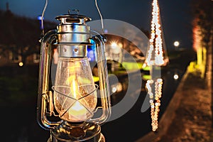 Oil lamp illuminates old character in Ducth village