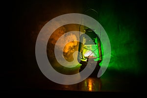 Oil Lamp Lighting up the Darkness or Burning kerosene lamp background, concept lighting. Selective focus