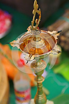 Oil lamps on Indian wedding ceremony