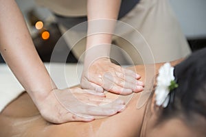 Oil massage on back by therapists