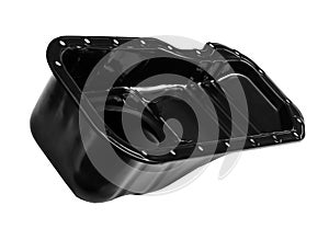 Oil pan of a car engine on a white background